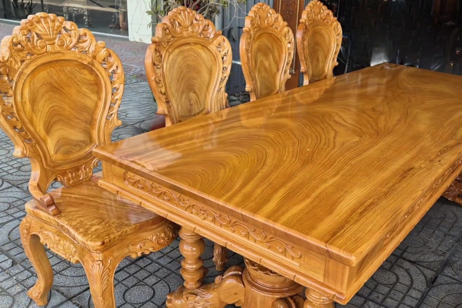 Chi tiết bộ bàn ăn chân sư tử gỗ gõ đỏ 8 ghế Louis sang trọng