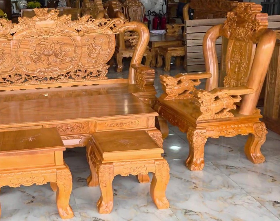 Chi tiết chạm Nghê Phượng trên bàn ghế gỗ tay 12