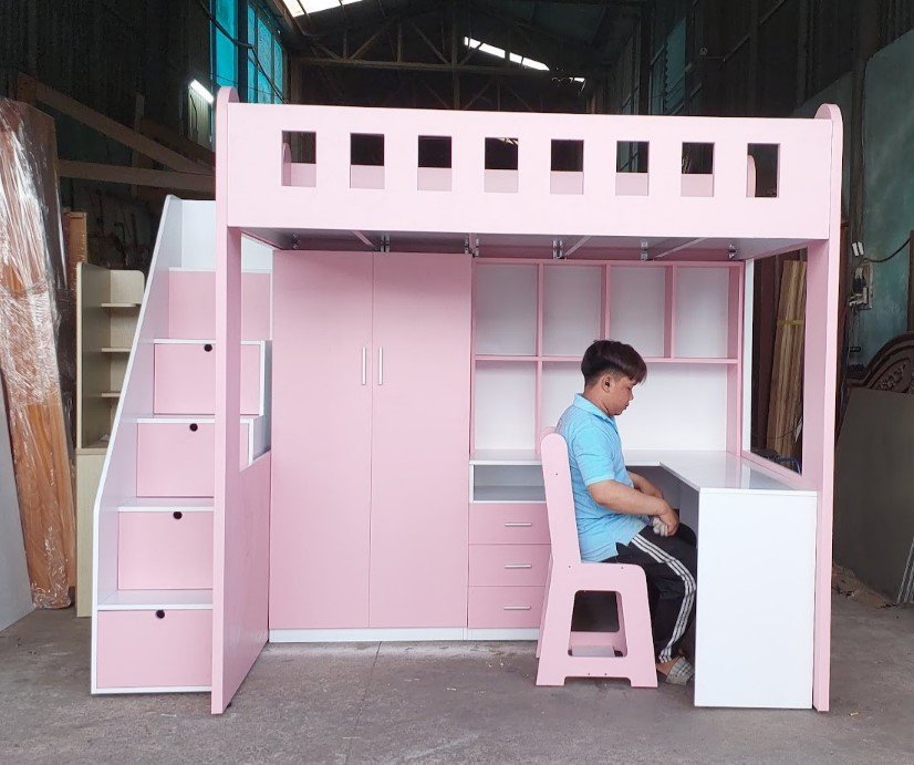 Mặt bên giường tầng có bàn học và tủ áo liền khối