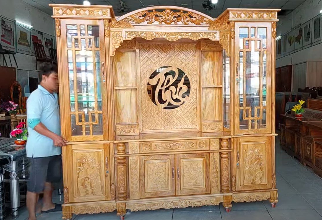 Mặt bên tủ kệ tivi phòng khách gỗ gõ đỏ tự nhiên