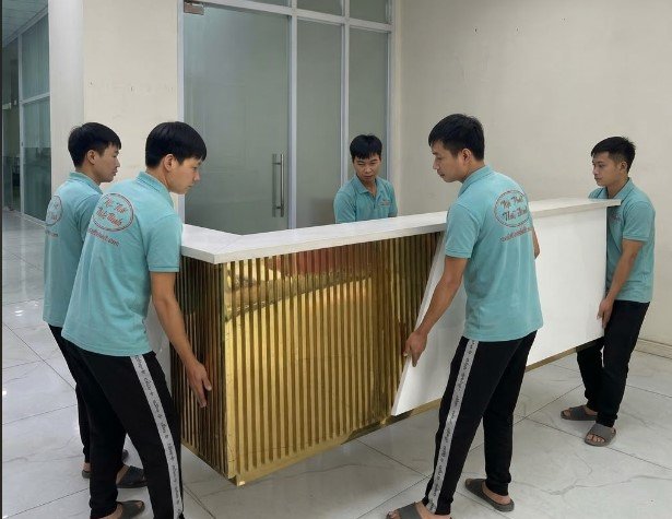 Sản phẩm quầy lễ tân chữ L trong không gian văn phòng